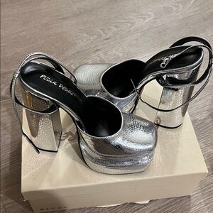 Public Desire Metallic Silver Platform Heels
Brand new